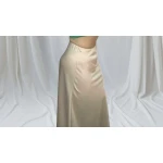 Saia Encanto de Cetim" de cetim feminina, disponível em três cores e tamanho único até XL, com elástico na cintura.