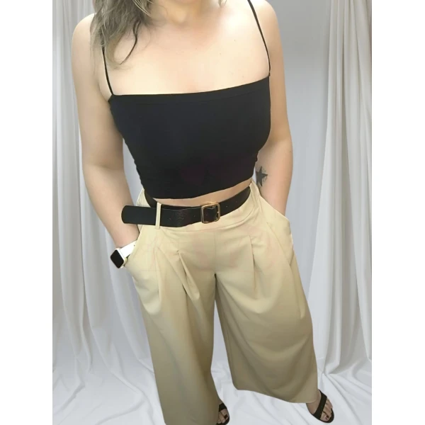 Pantalonas Aura Sofisticada disponíveis em preto, cinzento escuro e bege claro